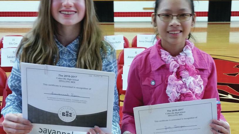 Seventh-grader Zoe Barger (right) won the Cedarville Middle School spelling bee, and sixth-grader Savannah Tison (left) was the runner up. SUBMITTED