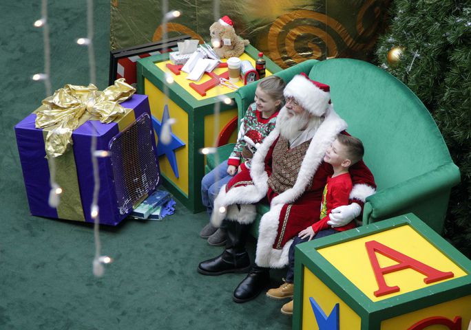 PHOTOS: A visit with Santa Claus makes the holiday season magical