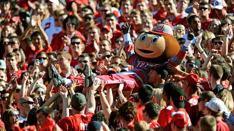 COLUMBUS, OH - SEPTEMBER 25:  Mascot Brutus Buckeye is carried up the stands by fans during a game against the Eastern Michigan Eagles at Ohio Stadium on September 25, 2010 in Columbus, Ohio.  (Photo by Jamie Sabau/Getty Images)