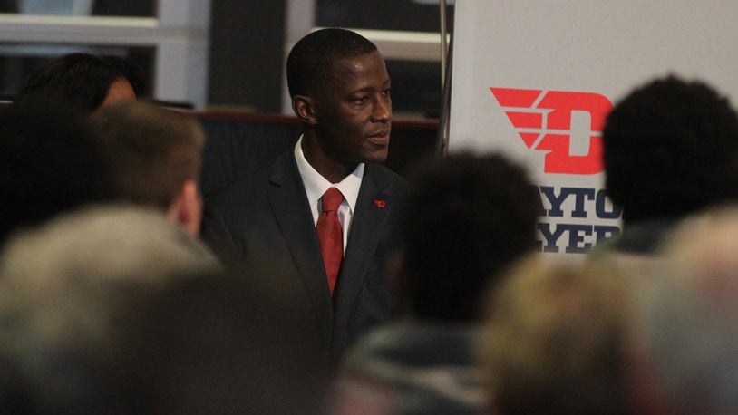 Dayton basketball coach Anthony Grant waits to speak at his introductory press conference on Saturday, April 1, 2017, at UD Arena. David Jablonski/Staff