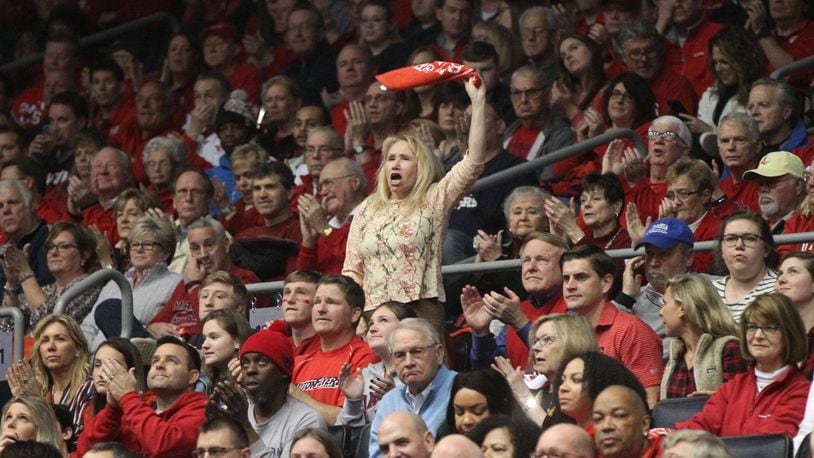 A Dayton fan cheers during a game against Saint Louis on Saturday, Feb. 23, 2019, at UD Arena. David Jablonski/Staff