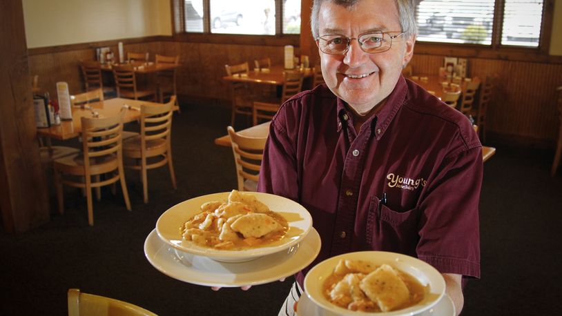 Dan Young, owner of Young's Jersey Dairy and the Golden Jersey Inn in Clark County, is incorporating some lower-calorie and smaller-portion options into his restaurant's menu. Two sizes of chicken and dumplings are available. On the left is an order that is approximately 600 calories and at right is a smaller order at approximately 350 calories. Both orders come with a selection of side dishes. LISA POWELL / STAFF