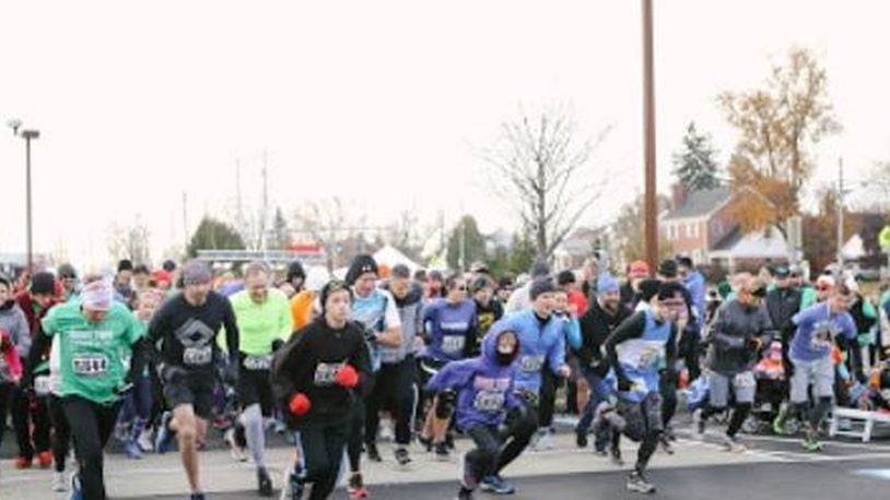The Thanksgiving 5K in Hamilton is a growing local tradition that started a few years ago with 30 runners. Now, hundreds participate in the event that raises funds for a ministry that helps teen mothers and their children.