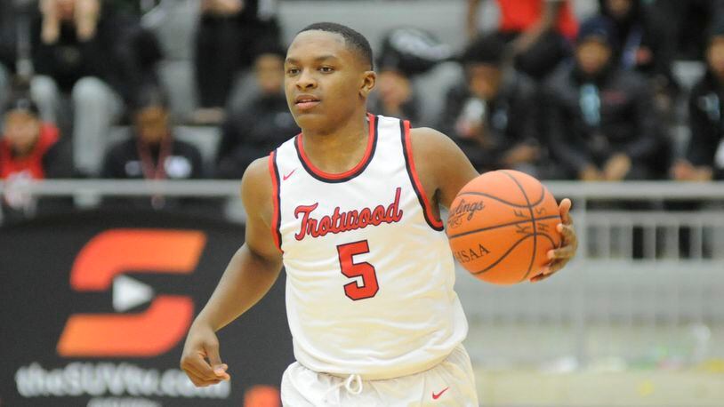 Keontae Huguely and Trotwood-Madison shot to No. 1 in the D-II boys state basketball poll. MARC PENDLETON / STAFF
