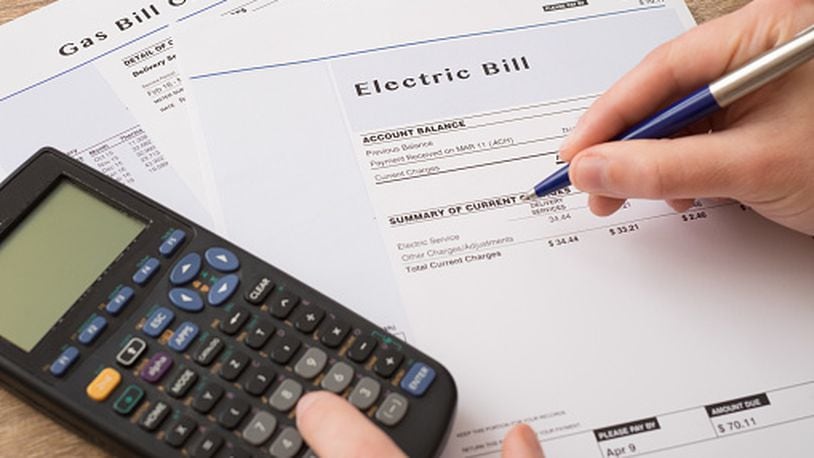Electric bill charges paper form on the table