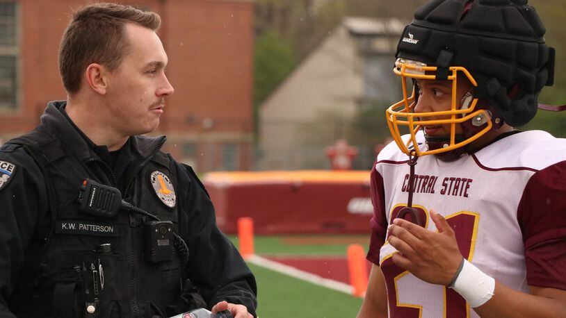 Central State police officer Kole Patterson and Marauders football player Jose Chaires. Central State Athletics photo
