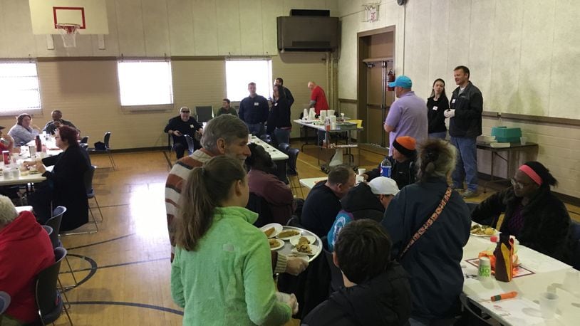 More than 300 meals were served Thursday during a community Thanksgiving dinner at Zion Evangelical Lutheran Church in Hamilton. ED RICHTER/STAFF