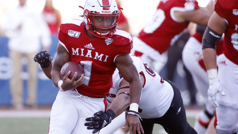 OXFORD, OHIO - OCTOBER 19: Jaylon Bester #1 of the Miami of Ohio Redhawks runs the ball during the fourth quarter in the game against the Northern Illinois Huskies at Yager Stadium on October 19, 2019 in Oxford, Ohio. (Photo by Justin Casterline/Getty Images)
