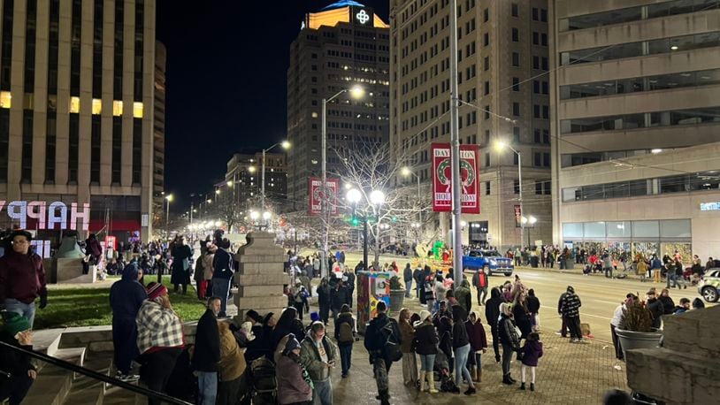 A scene from downtown Dayton after people scrambled to leave the area following a gunshot heard Friday, Nov. 25, 2022, during the Children's Parade at the Dayton Holiday Festival. ALLISON SWANSON/STAFF
