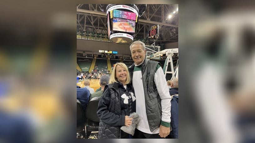 Wright State legend Bob Grote and wife Becky Grimes recently at a Wright State game at the Nutter Center. CONTRIBUTED