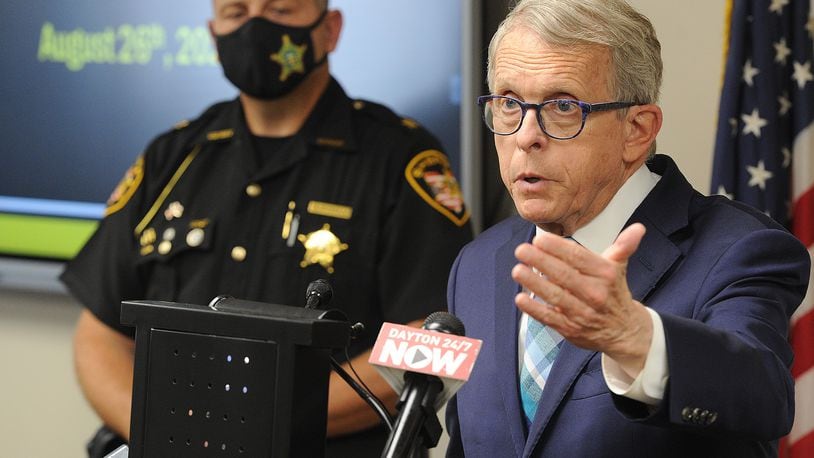 Governor Mike DeWine held a press conference with Sheriff Rob Streck Thursday morning, Aug. 26, 2021 to discus drug trends and investigations in Montgomery County. MARSHALL GORBY\STAFF
