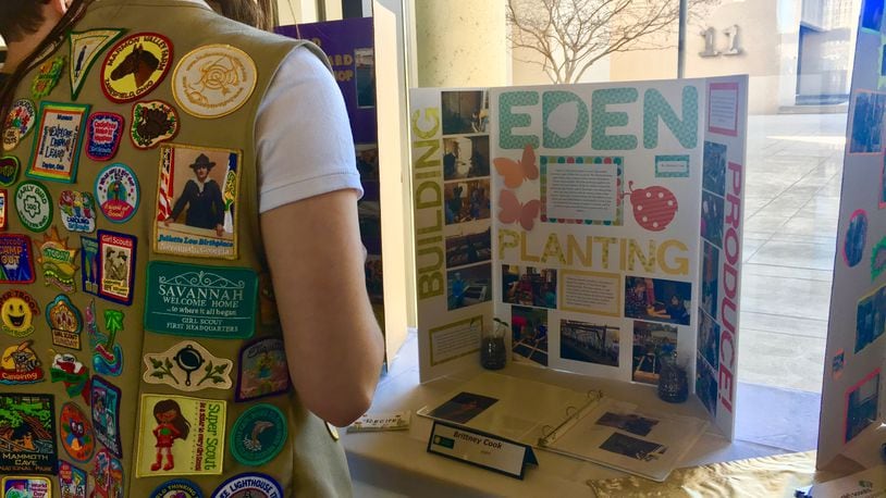 Local Girl Scouts look over the projects that won Gold Awards this year, the top honor for high school Girl Scouts. 21 Dayton-area Girl Scouts received the award this year and were honored at a ceremony at Sinclair Community College Sunday, March 4, 2018.