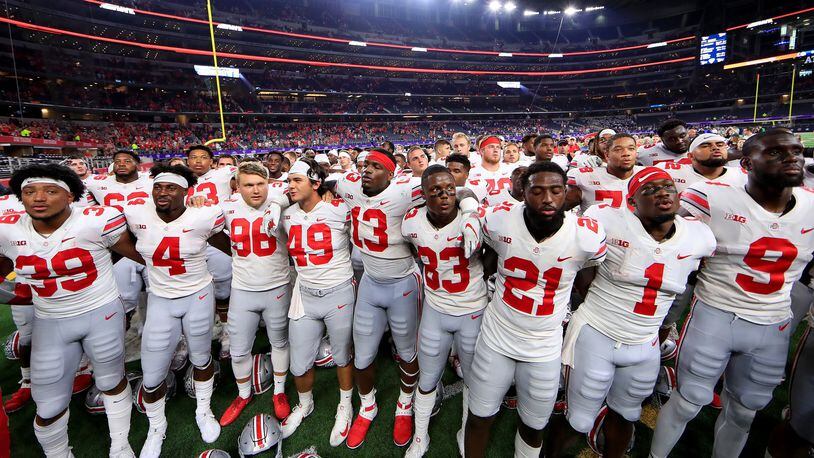 The Ohio State Buckeyes celebrate after beating the TCU Horned Frogs 40-28 during The AdvoCare Showdown at AT&T Stadium on September 15, 2018 in Arlington, Texas. (Photo by Tom Pennington/Getty Images)