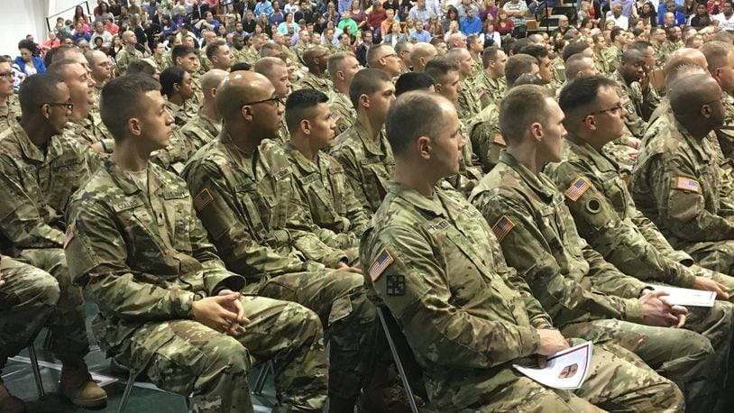 Members of the Ohio National Guard 371st, headquartered in Springfield, is shown at a deployment ceremony Saturday. The brigade is set to deploy to Southwest Asia this week. PARKER PERRY / STAFF