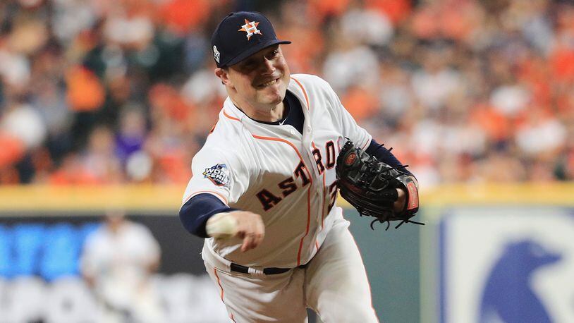 Astros reliever Joe Smith pitches against the Washington Nationals during the ninth inning in Game One of the 2019 World Series at Minute Maid Park on October 22, 2019 in Houston, Texas. (Photo by Mike Ehrmann/Getty Images)