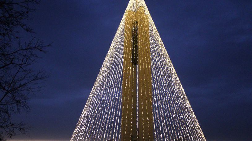 Ohio’s largest tree of lights, 200 feet tall, is now lighting up the night sky at Carillon Historical Park in Dayton. The holiday fun continues with a month-long celebration filled with holiday-themed activities at the park. TODD JACKSON/STAFF