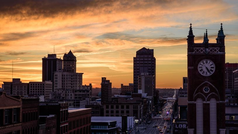 Downtown Dayton at sunset. TOM GILLIAM / STAFF