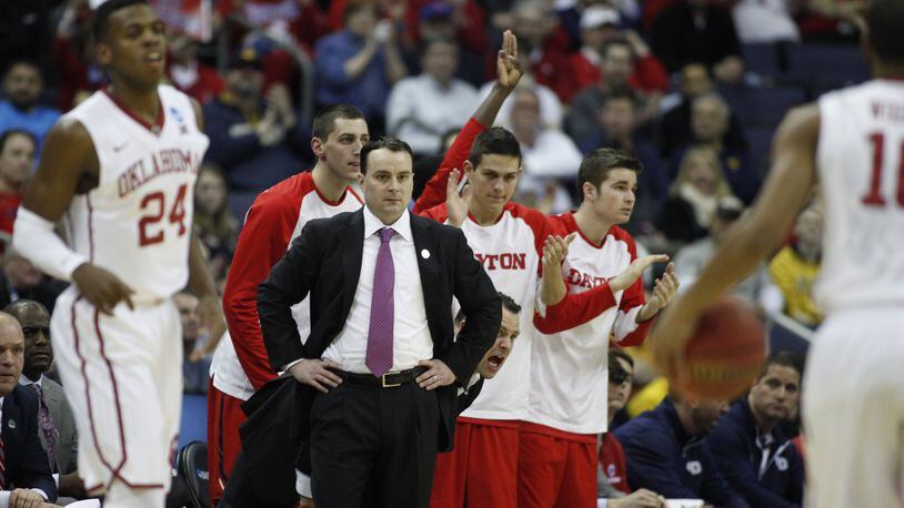 Coach Archie Miller watches as Dayton plays Providence in the second round of the NCAA tournament on Friday, March 20, 2015, at Nationwide Arena in Columbus. David Jablonski/Staff