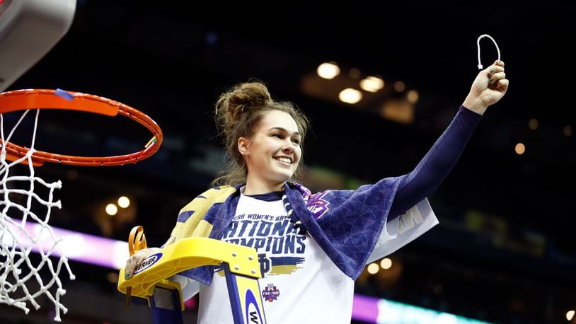 COLUMBUS, OH - APRIL 01: Kathryn Westbeld #33 of the Notre Dame Fighting Irish cuts down the net after scoring the game winning basket to defeat the Mississippi State Lady Bulldogs in the championship game of the 2018 NCAA Women’s Final Four at Nationwide Arena on April 1, 2018 in Columbus, Ohio. The Notre Dame Fighting Irish defeated the Mississippi State Lady Bulldogs 61-58. (Photo by Andy Lyons/Getty Images)