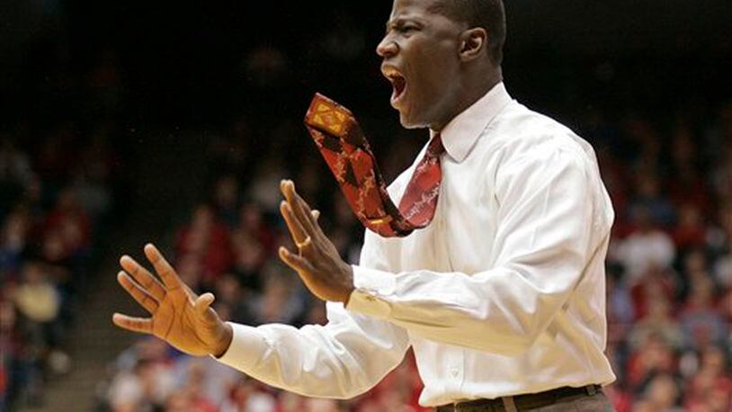 Alabama coach Anthony Grant shouts at his team during the second half of an NCAA college basketball game against Dayton on Wednesday, Dec. 7, 2011, in Dayton, Ohio. Dayton defeated Alabama 74-62. Grant played for Dayton in the 1980s. (AP Photo/Skip Peterson)