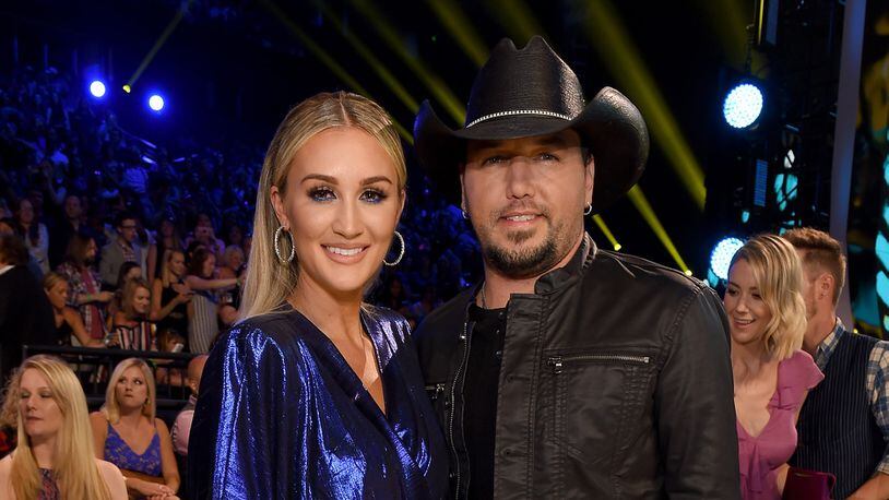 Jason Aldean (R) and Brittany Kerr revealed they are expecting a baby girl. (Photo by Jason Kempin/Getty Images for CMT)