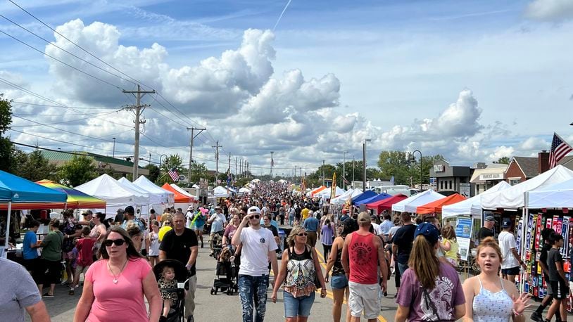 Thousands of festival-goers came out to enjoy the 34th annual Popcorn Festival in Beavercreek this weekend. AIMEE HANCOCK / STAFF