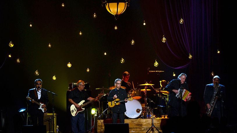 LOS ANGELES, CA - FEBRUARY 06:  (L-R) Musicians Cesar Rosas, Conrad Lozano, Louie Perez, David Hidalgo and Steve Berlin of Los Lobos perform onstage at the 25th anniversary MusiCares 2015 Person Of The Year Gala honoring Bob Dylan at the Los Angeles Convention Center on February 6, 2015 in Los Angeles, California. The annual benefit raises critical funds for MusiCares' Emergency Financial Assistance and Addiction Recovery programs.  (Photo by Frazer Harrison/Getty Images)