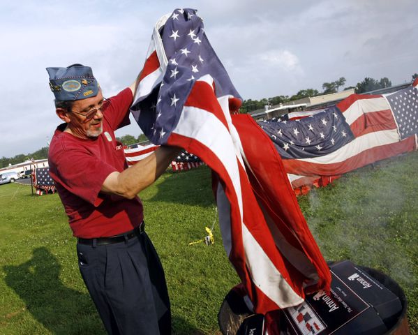 PHOTOS: 10 of our best images of powerful, somber and honorably destroyed flags through the years