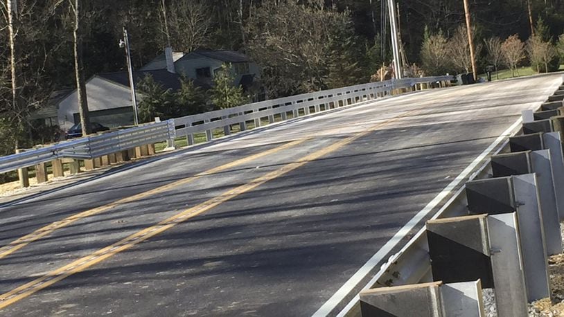 A bridge on Alex-Bell Road over Holes Creek in Washington Twp. has reopened slightly ahead of schedule following a major reconstruction that began in early September. DREW TANNER / STAFF