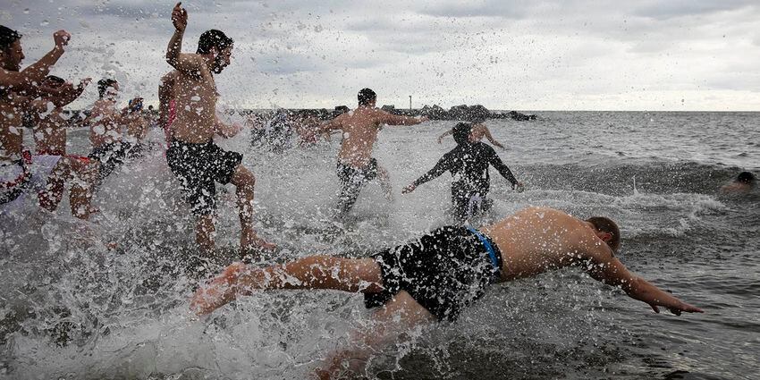 Photos: Thousands kick off the new year with a splash
