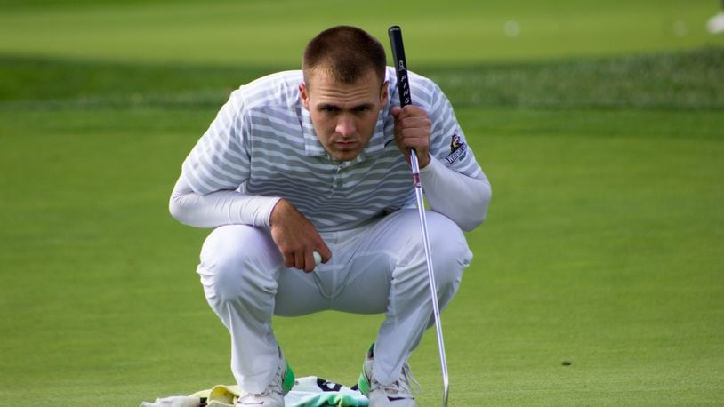 Bryce Haney lines up a putt during a tournament earlier this season. Haney recently was named Horizon League Freshman of the Year. Allison Rodriguez/CONTRIBUTED