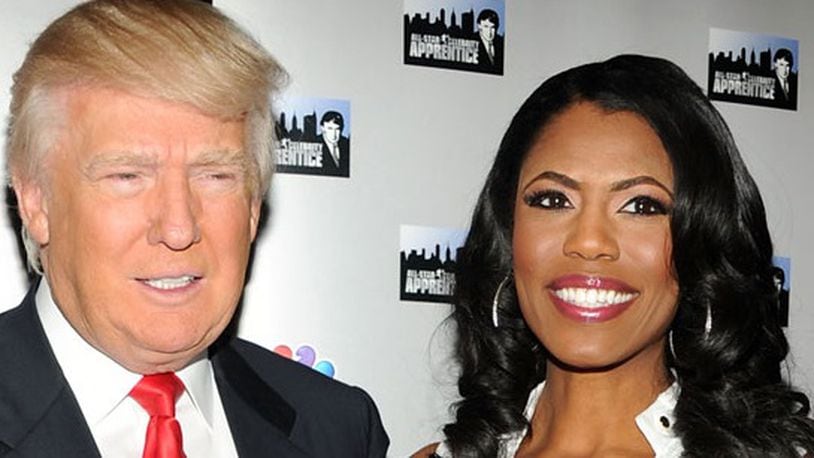 Omarosa Manigault (right) with Donald Trump. Photo by Ben Gabbe, Getty Images.