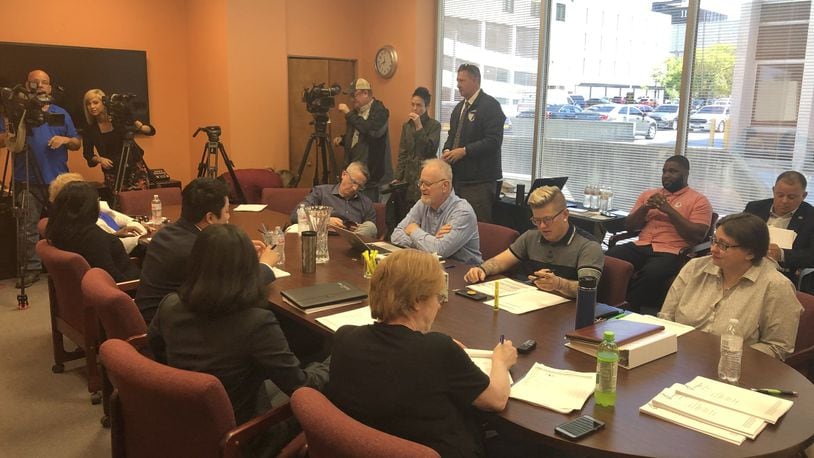 The Dayton Human Relations Council met on Monday for the first time since of of its employees was indicted on federal corruption charges. The council chair and a city attorney declined to comment on the case. CORNELIUS FROLIK / STAFF