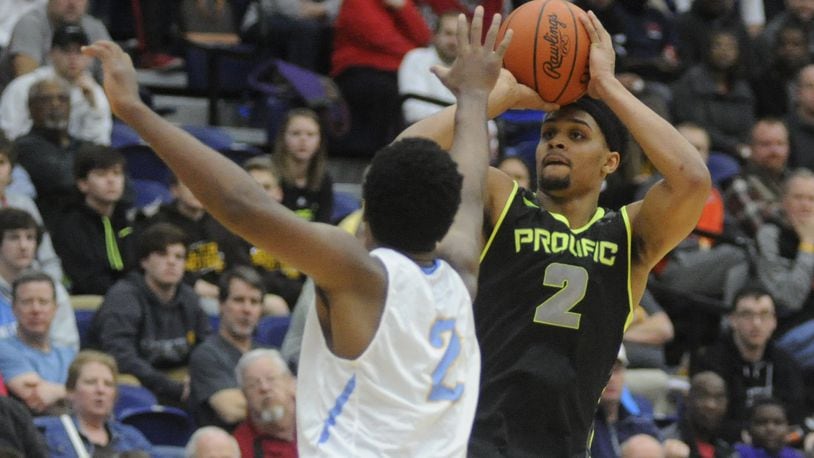 Gary Trent Jr. of Prolific Prep (shooting) tallied a game-high 33 points in a 66-64 loss to Huntington Prep during Day 3 of the Premier Health Flyin’ to the Hoop at Trent Arena in Kettering on Sunday, Jan. 15, 2017. MARC PENDLETON / STAFF