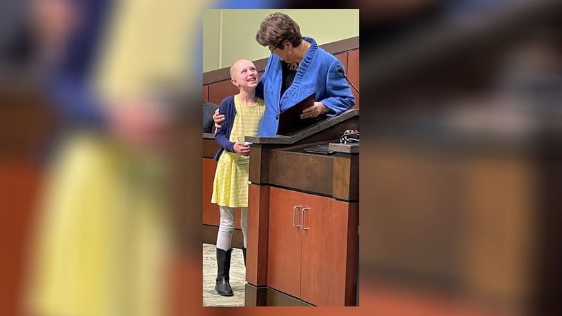 Chloe Adkins became the youngest recipient ever of the Kettering mayor’s volunteer award when Peggy Lehner presented it to her earlier this month. CONTRIBUTED