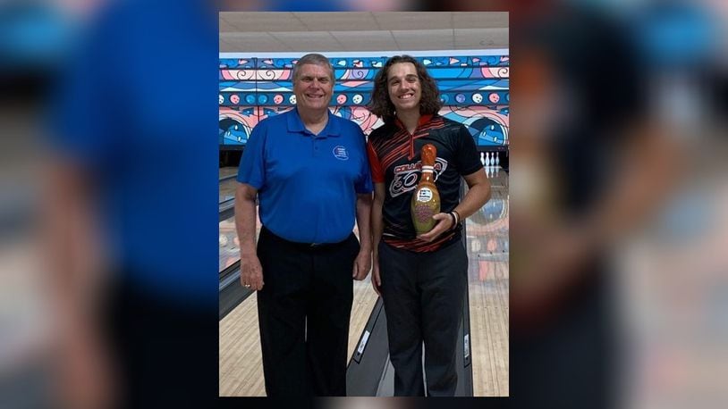Tournament champion Drew Sacks with Bill Henson of Henson’s Bowling Academy at the JTBA Championships at Park Lanes. CONTRIBUTED