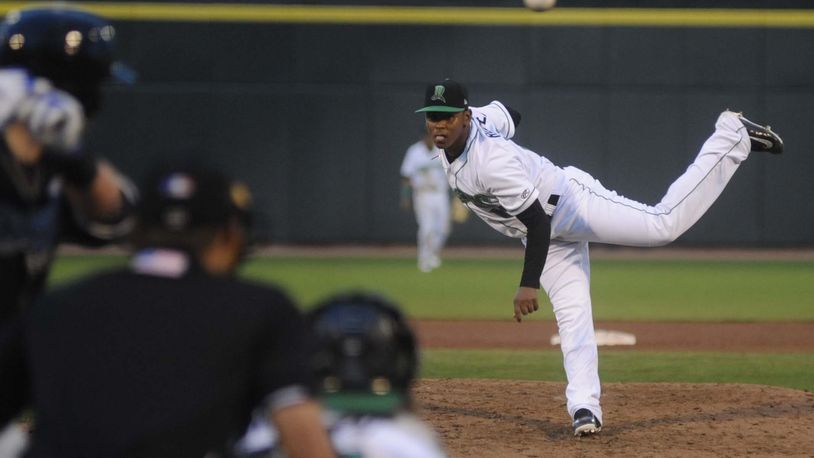 Dragons starting pitcher Wennington Romero delivers. The Dragons hosted the Lansing Lugnuts (Blue Jays) at Dayton’s Fifth Third Field in a Midwest League Class A minor-league baseball game on Wednesday, April 19, 2017. MARC PENDLETON / STAFF