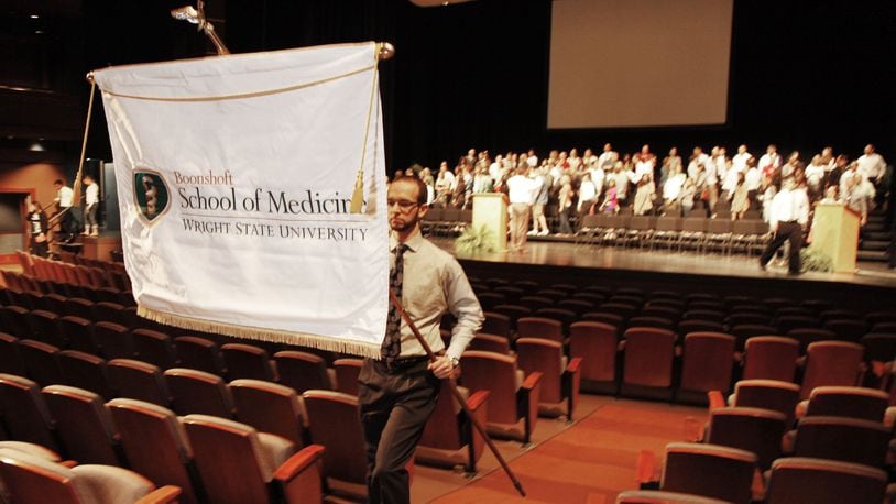 The Wright State University Boonshoft School of Medicine held its annual graduation ceremony on Friday, May 24, at the Schuster Performing Arts Center. The graduating class included 106 medical students who will help fill the growing need for primary care physicians. Studies show that the millions of new enrollees in Obamacare and the aging population will lead to a need for as many as 45,000 more primary care physicians by 2020. The problem is most medical students tend to see primary care as less groundbreaking or prestigious than specialty fields. And many students enter more lucrative specialty fields to pay off student debt from medical schools.