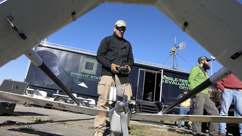 Dave Malek performs a safety check on a UAV before it takes off for one of the Air Force Research Labratory’s test flights at Springfield Beckley Municipal Airport Thursday. Bill Lackey/Staff
