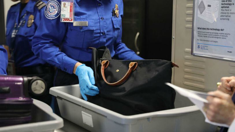 FILE PHOTO: The FBI said Friday that it will not be pursuing criminal charges "at this time" against the woman who boarded a plane at Orlando International Airport without a ticket earlier this month.