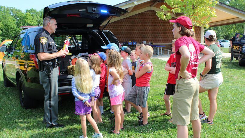 Washington Twp. officials are asking voters to approve a 2.3-mill, five-year replacement levy for police services. Officials say the sheriff s substation places a high priority on community engagement. MCSO School Resource Officer Gary Fulwiler visits summer camp in this photo.