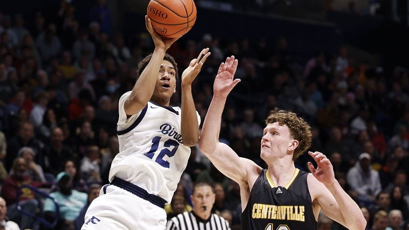 Kettering Fairmont's Anthony Johnson puts up a shot over Centerville's Tom House during their Division I regional basketball game Wednesday, March 9, 2022 at Cintas Center on the Xavier University campus in Cincinnati. NICK GRAHAM/STAFF