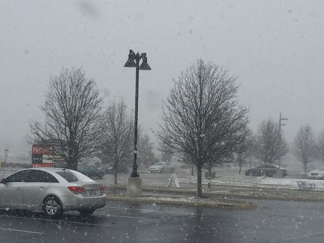 PHOTOS: Snow, strong winds hit Miami Valley