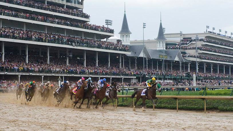 Palace Malice, with Mike Smith up, leads during the first turn of the 139th running of the Kentucky Derby at Churchill Downs in Louisville, Kentucky, on Saturday, May 4, 2013. (Briana Scroggins/Lexington Herald-Leader/TNS)