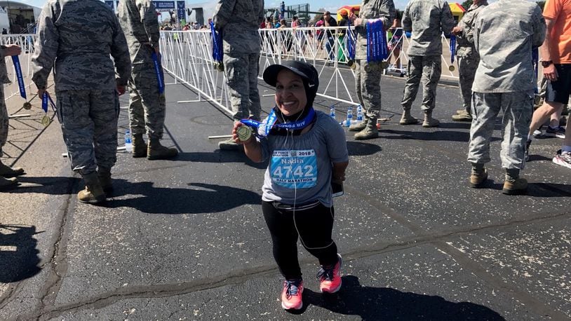Dr. Nadia Merchant after completing the half-marathon at Saturday’s USAF Marathon at Wright Patterson Air Force Base. Tom Archdeacon/STAFF