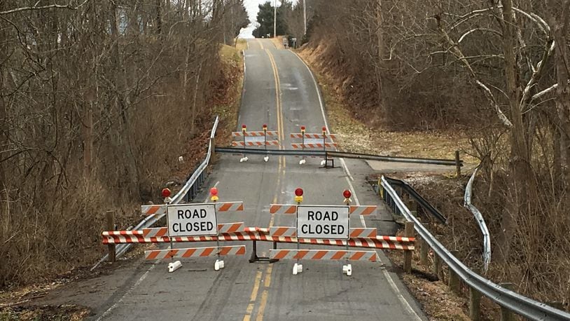 The Shawhan Road bridge, closed since a crash involving a hill-hopping teen on Jan. 5, has reopened. LAWRENCE BUDD/STAFF