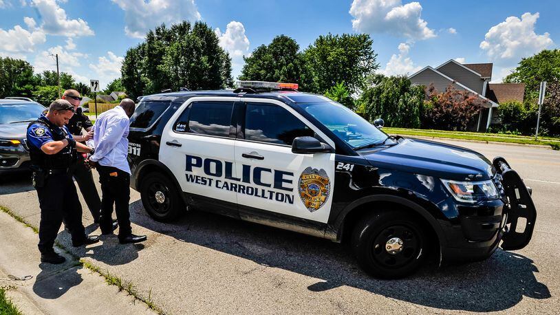 A recent Wright State University survey found more than 90 percent of West Carrollton residents were either very satisfied or satisfied with police services. In June, West Carrollton police apprehended a bank robbery suspect. FILE