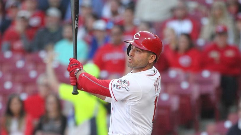 The Reds’ Joey Votto doubles against the Marlins on Tuesday, April 9, 2019, at Great American Ball Park in Cincinnati. David Jablonski/Staff