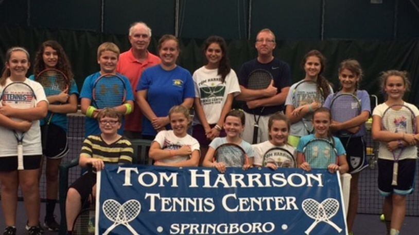 Tom Harrison and just a few of the more than 150 young players, who he weekly trains at his center in Springboro. CONTRIBUTED