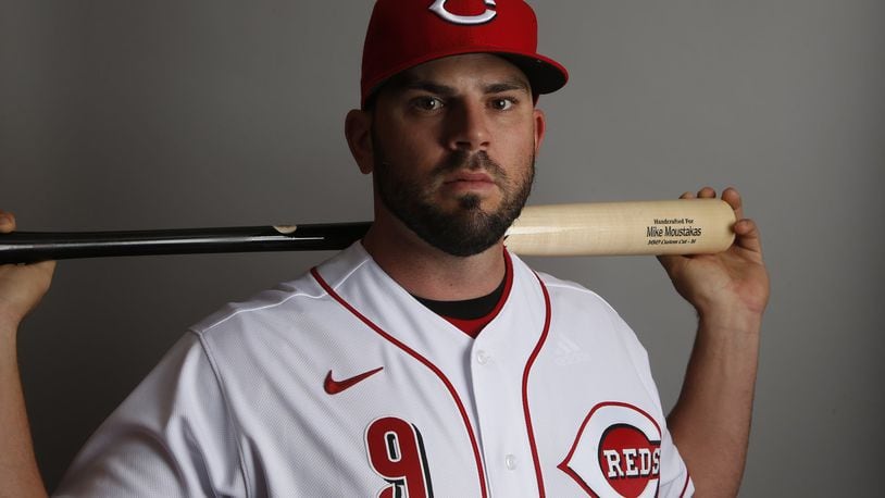 Cincinnati Reds second baseman Mike Moustakas poses for a photograph during spring training baseball photo day Wednesday, Feb. 19, 2020 in Goodyear, Ariz. (AP Photo/Ross D. Franklin)